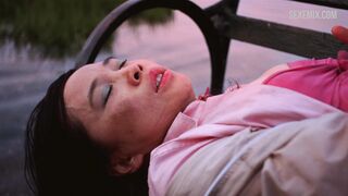 Sook-Yin Lee masturbates on a bench, scene in Shortbus