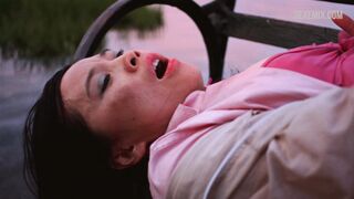 Sook-Yin Lee masturbates on a bench, scene in Shortbus