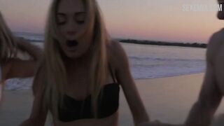 Maria Louis in black bikini on the beach, scene in #FollowMe