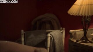 Elodie Frege breasts,  bathroom scene in La main du mal (2016)