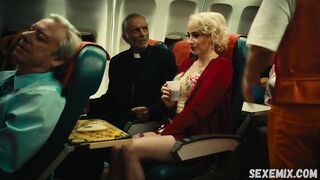 Jin N Tonic shows us her beautiful cleavage, scene in Exorcism At 60,000 Feet