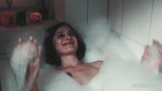 Anna Heidegger shows us her small boobs, scene in Schaumbad (2016)