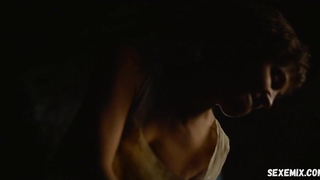 Alicia Vikander is showing us a good cleavage. scene in The Green Knight (2021)