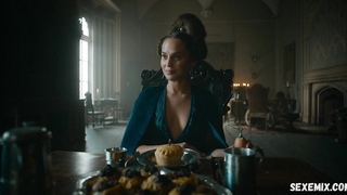 Alicia Vikander is showing us a good cleavage. scene in The Green Knight (2021)