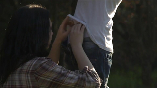 Young sexy Couple going wild in nature